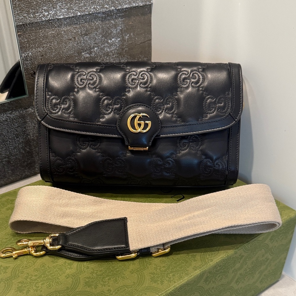 Gucci Black Embossed Crossbody Bag with Gold Logo
